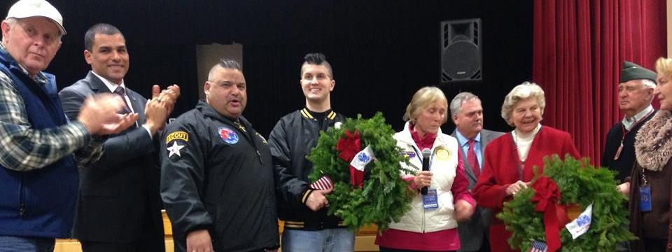 Members Vincent Manion Brodeur, with wreath, (Father Jeff on his left) with our friends at Wreaths Across America.
